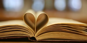 Book pages folded to form a heart