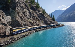 the Rocky Mountaineer travels through western Canda through mountains and along rivers